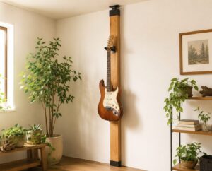 2×4材の突っ張り柱にギターを1本壁掛けしたナチュラルな部屋（イメージ）